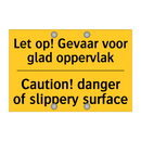 Let op! Gevaar voor glad oppervlak - Caution! danger of slippery surface
