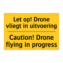Let op! Drone vliegt in uitvoering - Caution! Drone flying in progress