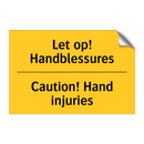 Let op! Handblessures - Caution! Hand injuries