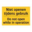 Niet openen tijdens gebruik - Do not open while in operation
