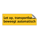 Let op, transportband beweegt automatisch