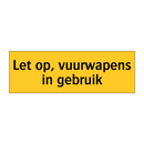 Let op, vuurwapens in gebruik