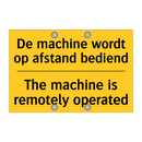 De machine wordt op afstand bediend - The machine is remotely operated
