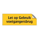 Let op Gebruik voetgangersbrug