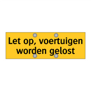 Let op, voertuigen worden gelost