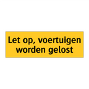 Let op, voertuigen worden gelost