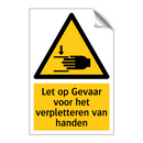 Let op Gevaar voor het verpletteren van handen