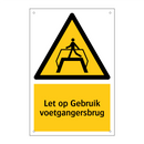 Let op Gebruik voetgangersbrug