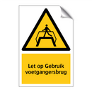 Let op Gebruik voetgangersbrug