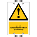 Let op! Transportbandsysteem op spoorweg