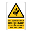 Let op! Risico op beknelling tussen gereedschappen van een pers