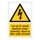 Let op! Er wordt gewerkt onder spanning. Houd te allen tijde afstand!