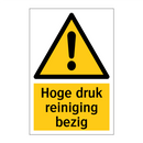 Hoge druk reiniging bezig