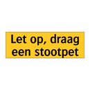 Let op, draag een stootpet