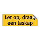 Let op, draag een laskap