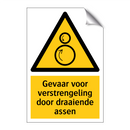 Gevaar voor verstrengeling door draaiende assen