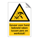 Gevaar voor hand bekneld raken tussen pers en werkstuk!