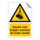 Gevaar voor knijpen wanneer de kraan zwaait