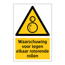 Waarschuwing voor tegen elkaar roterende rollen