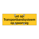 Let op! Transportbandsysteem op spoorweg