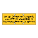 Let op! Gevaar van hangende lasten! Wees voorzichtig /.../