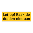 Let op! Raak de draden niet aan