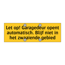 Let op! Garagedeur opent automatisch. Blijf niet in /.../
