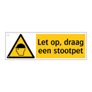 Let op, draag een stootpet