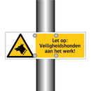 Let op: Veiligheidshonden aan het werk!