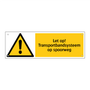 Let op! Transportbandsysteem op spoorweg