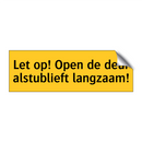 Let op! Open de deur alstublieft langzaam!