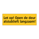 Let op! Open de deur alstublieft langzaam!